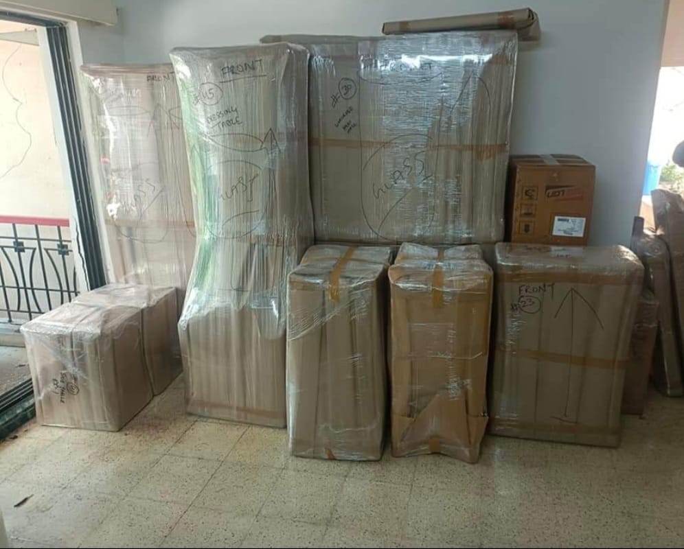 Patna Packers office shifting team moving furniture in Patna business district